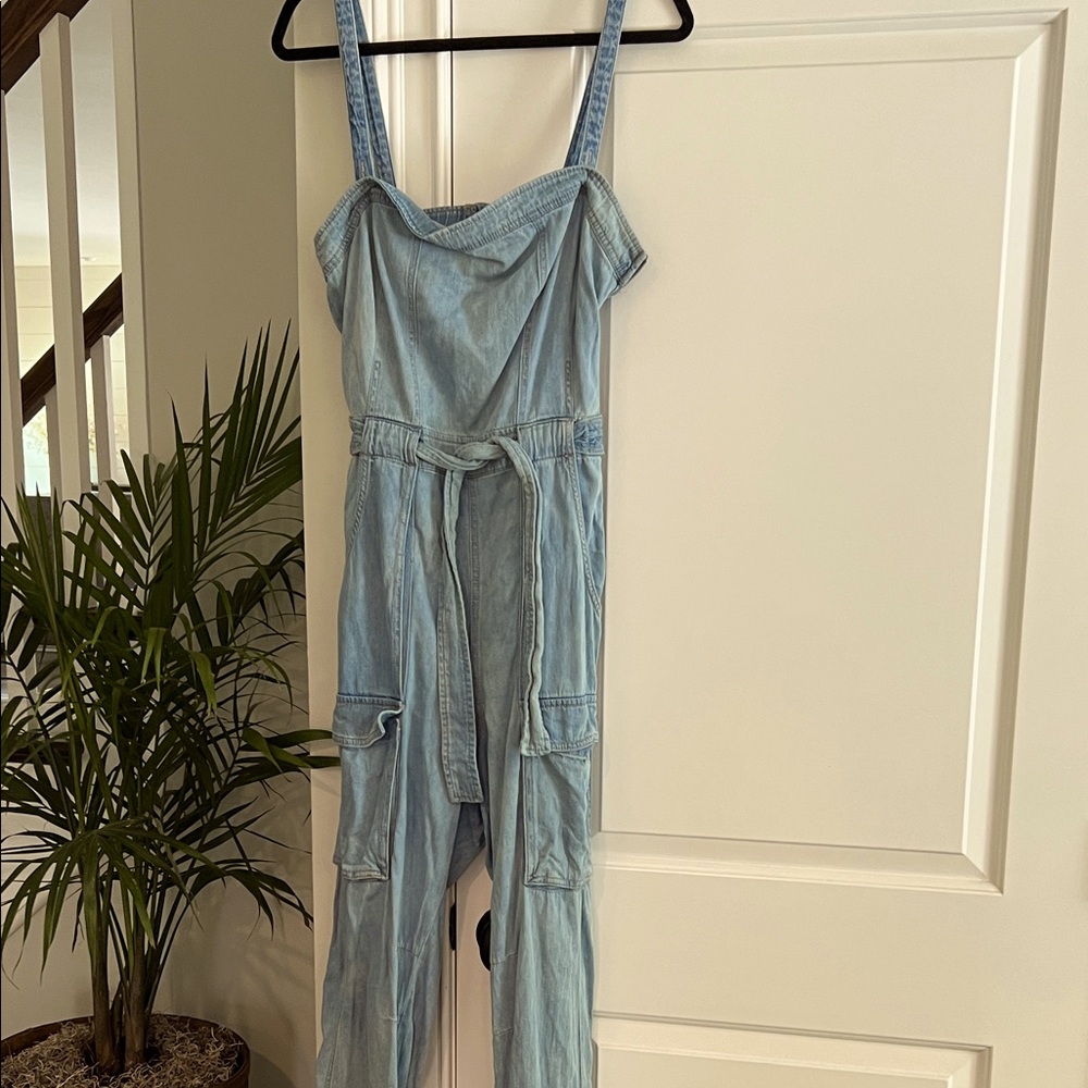 Free People Light Blue Denim backless Jumpsuit size Large